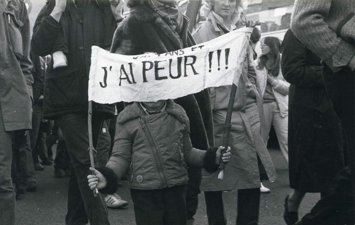 Foto van jongetje tijdens de betoging van 1983